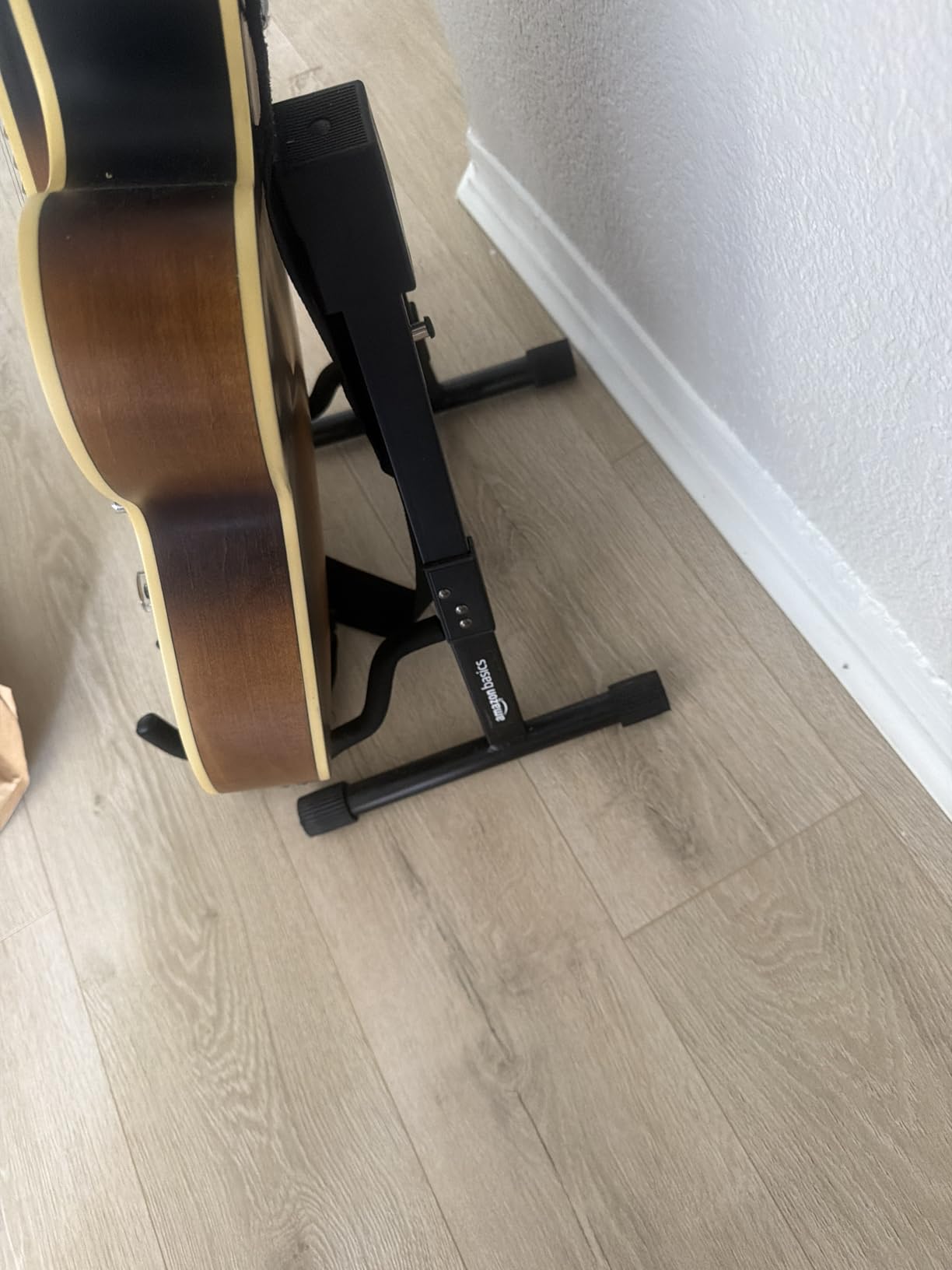 Amazon Basics Portable Adjustable Folding Guitar Stand for Electric and Acoustic Guitars, A-shape, Fully Assembled with Padded Foam, Black, 8.66 x 15.16 x 3.74 inches customer photo 1