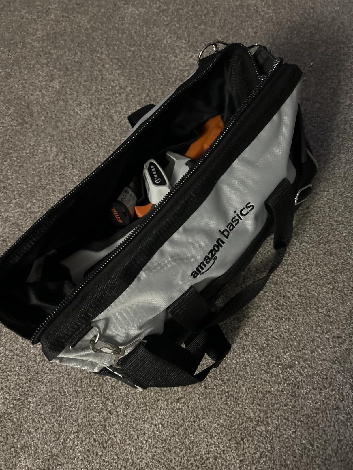 Amazon Basics Durable Wear-Resistant Tool Storage Bag with Adjustable Shoulder Strap, Portable Tool Organizer, 16 Pockets, 12 in, Black & Gray customer photo 1