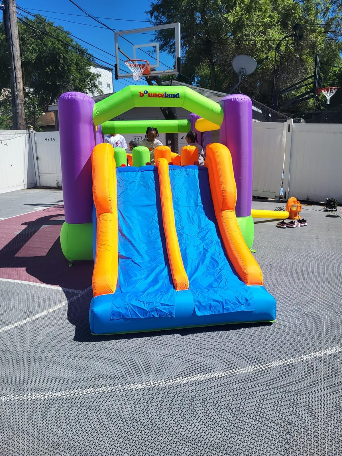 Bounceland Pro Racer Obstacle Bounce House with Dual Slides, Bounce, Climb, Slide All in One, UL 1 HP Blower Included, 19 ft x 9 ft x 7 ft H, Great for Big Party, Fun Racing Game in Teams customer photo 1