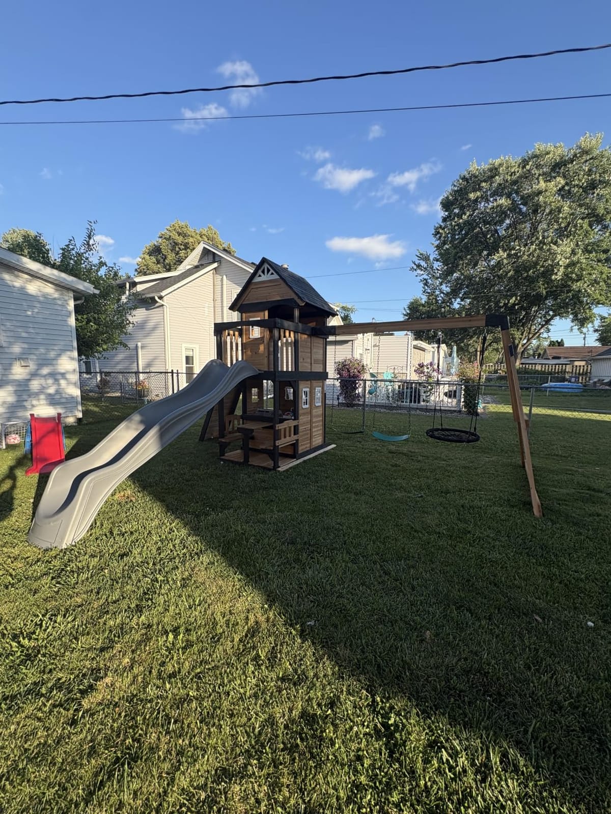 Backyard Discovery Canyon Creek Cedar Wood Swing Set with Wave Slide, Clubhouse, Play Kitchen, Picnic Area, Belt Swings, Web Swing, Rock Wall, Balconies, Playhouse, Step Ladder, Outdoor Playset customer photo 2