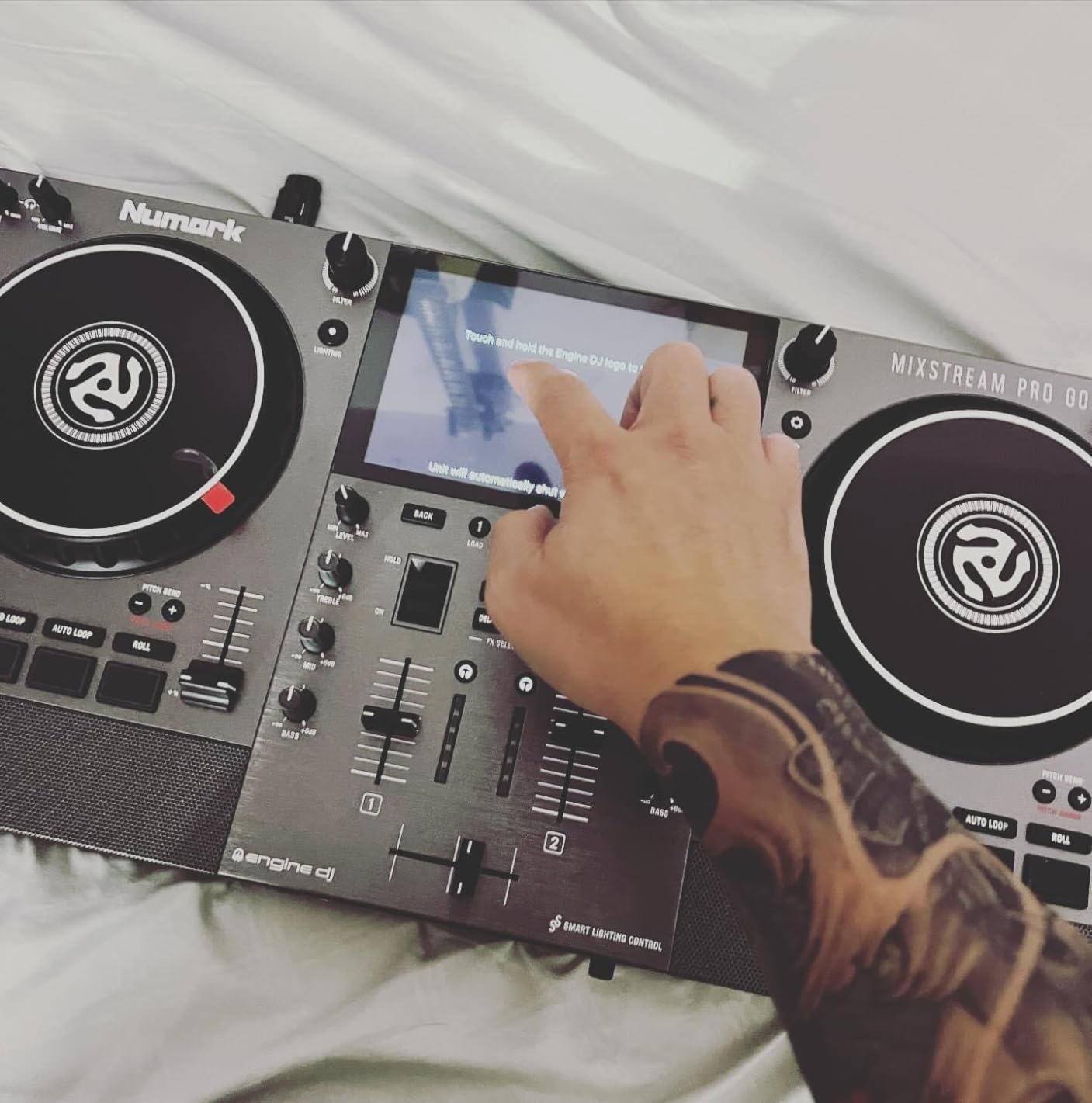 Numark Mixstream Pro Go Portable DJ Controller | Battery-Powered Standalone DJ Mixer with Stem Separation, Wi-Fi Streaming, Built-In Speakers, and 7